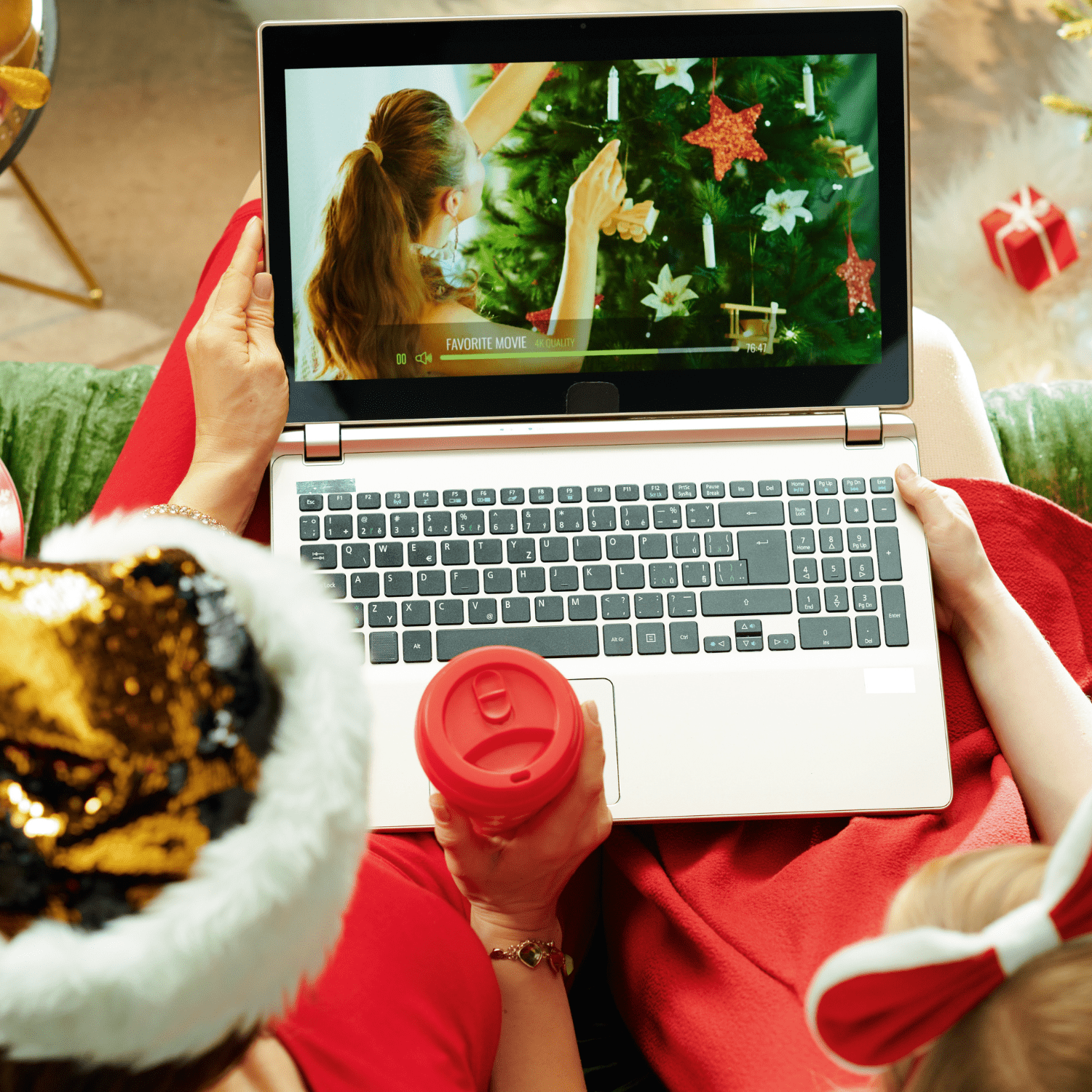 streaming Disney Plus Christmas movies on laptop