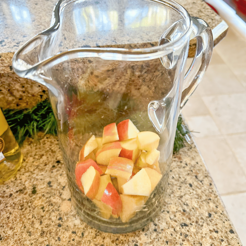 Chopped apples in a pitcher 