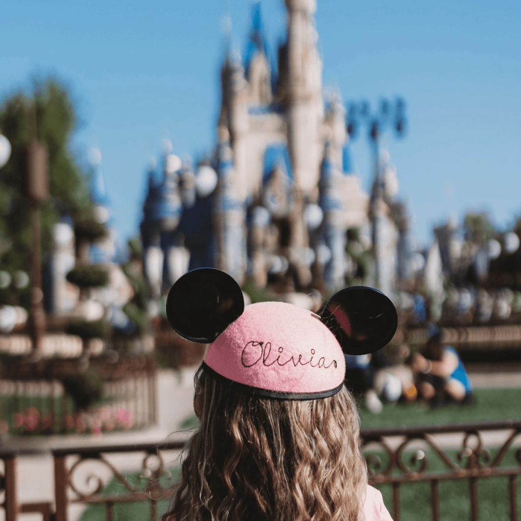Unique Disney Souvenirs Custom Embroidered Mickey Hat in front of Castle